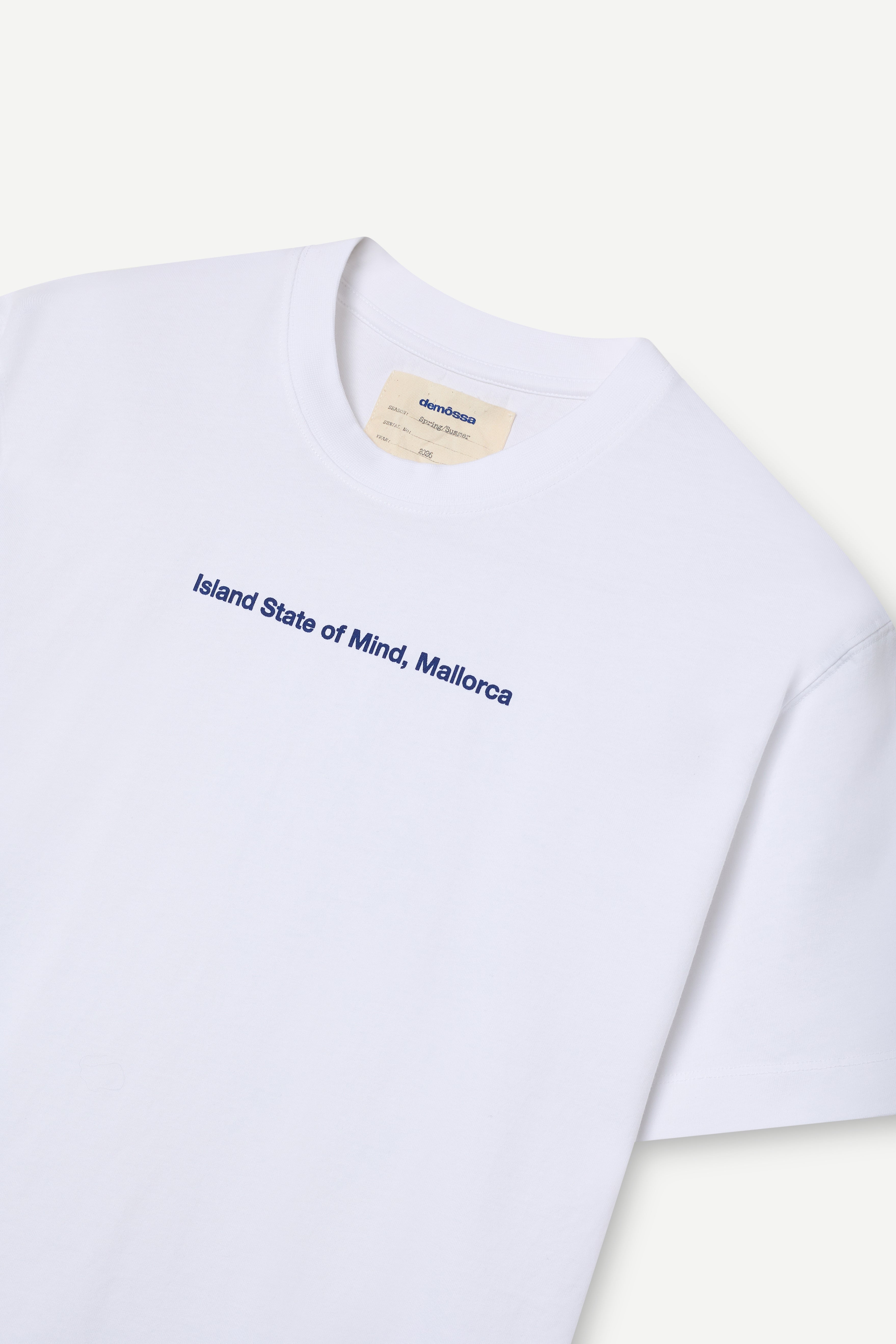front view of a regular fit short-sleeved t-shirt with blue print "Island State of Mind, Mallorca" on the chest