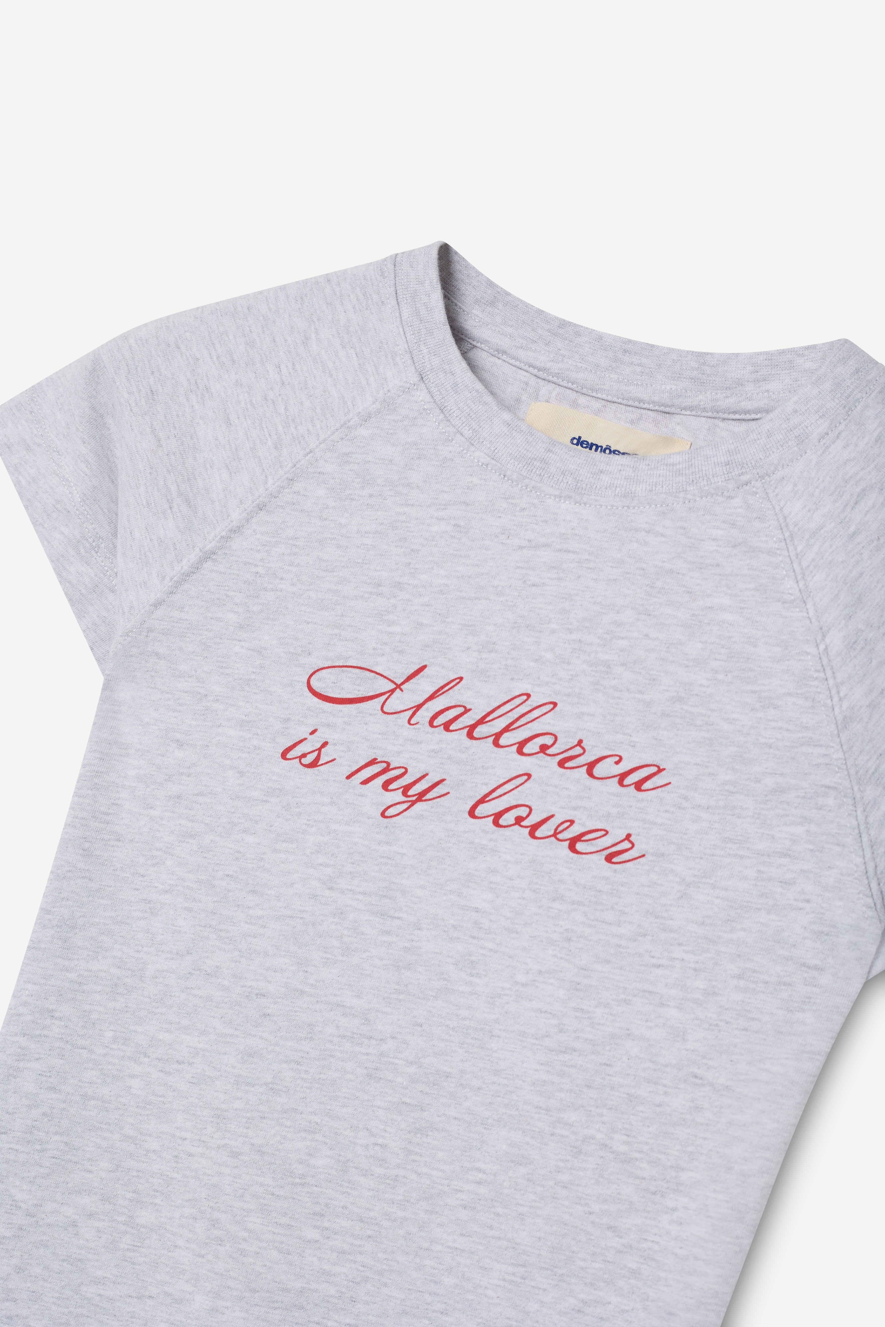 Gray t-shirt with 'mallorca is my lover' text in red on a white background