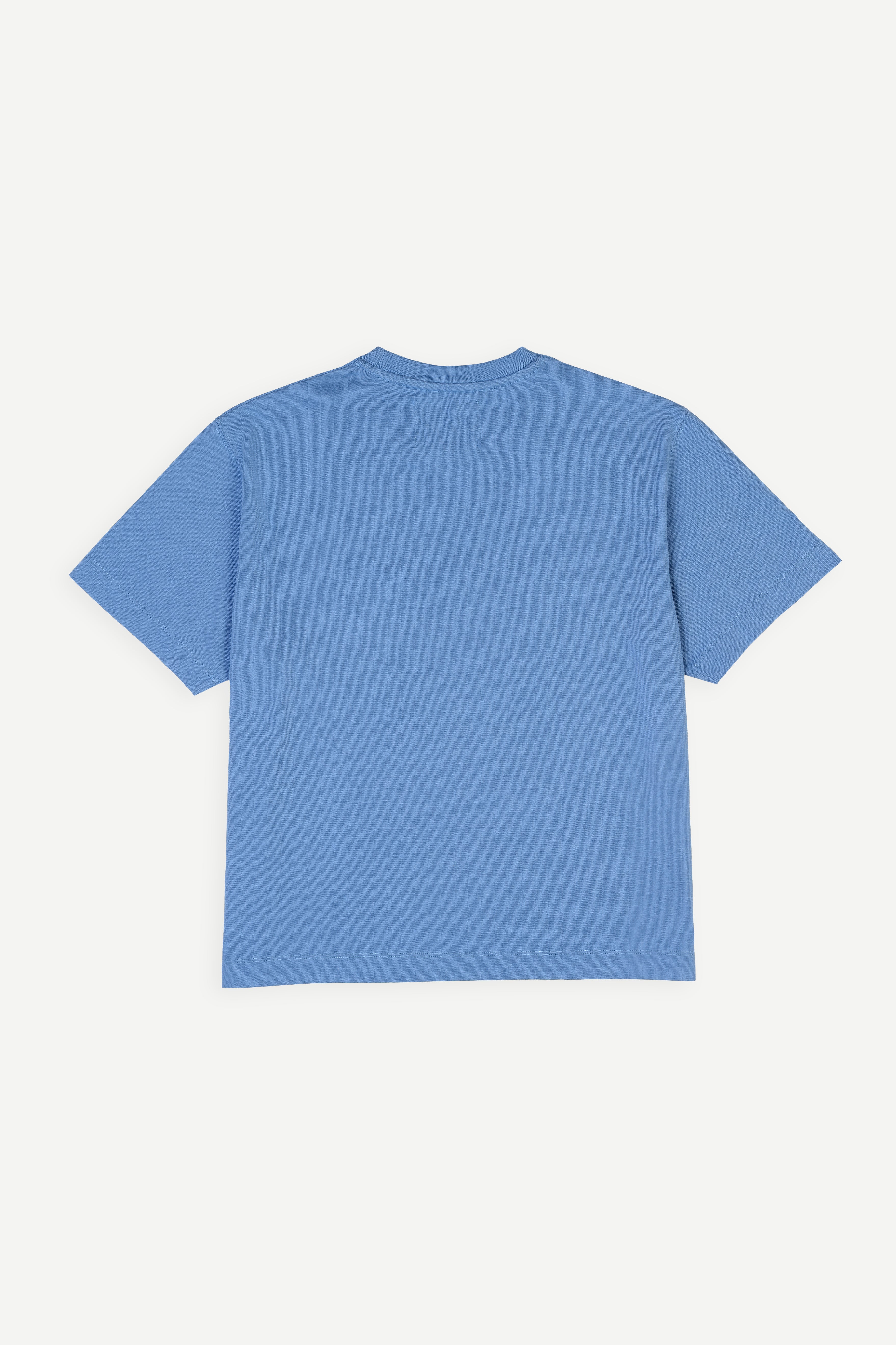 Blue t-shirt on a light gray background