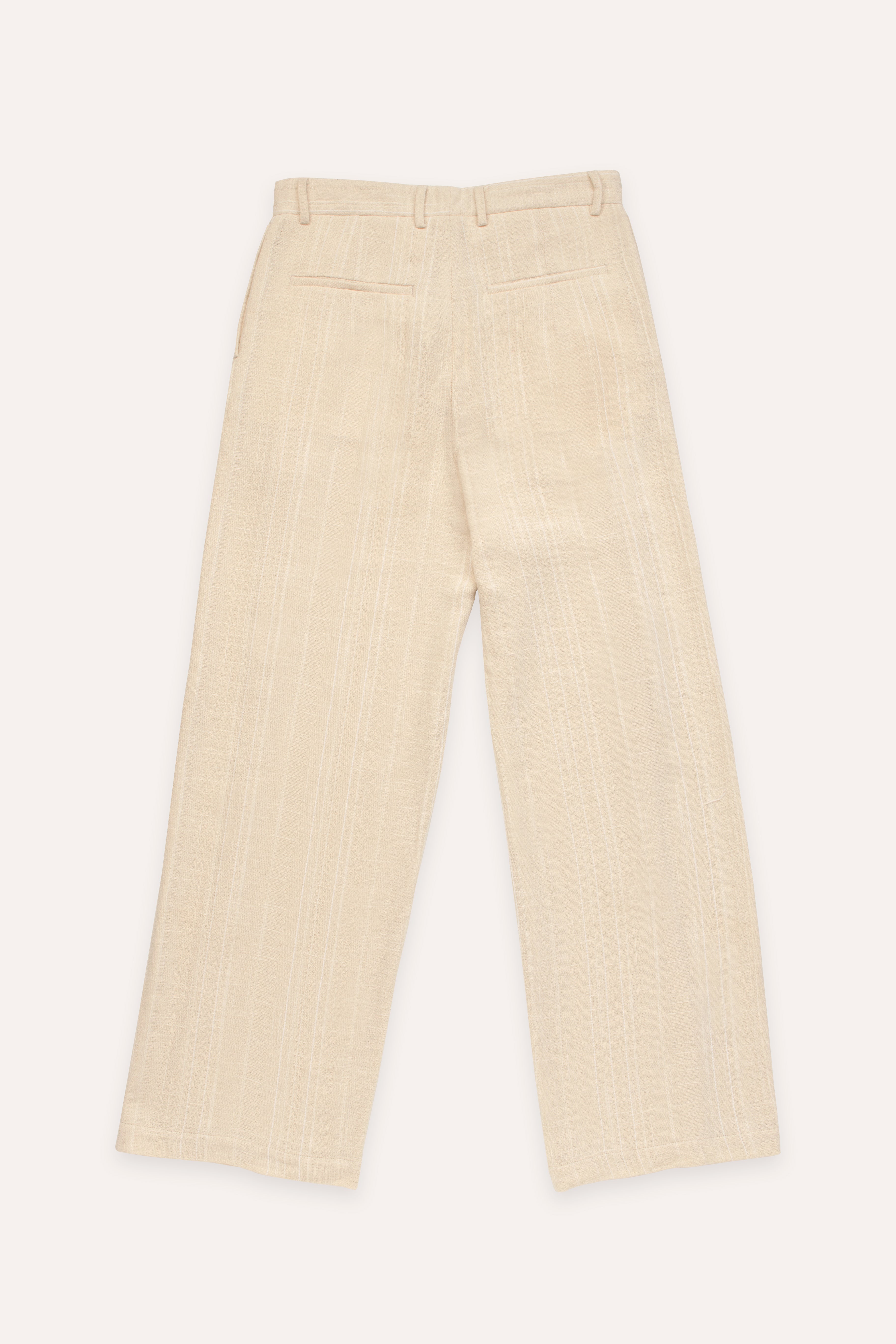 Cream pants on a white background