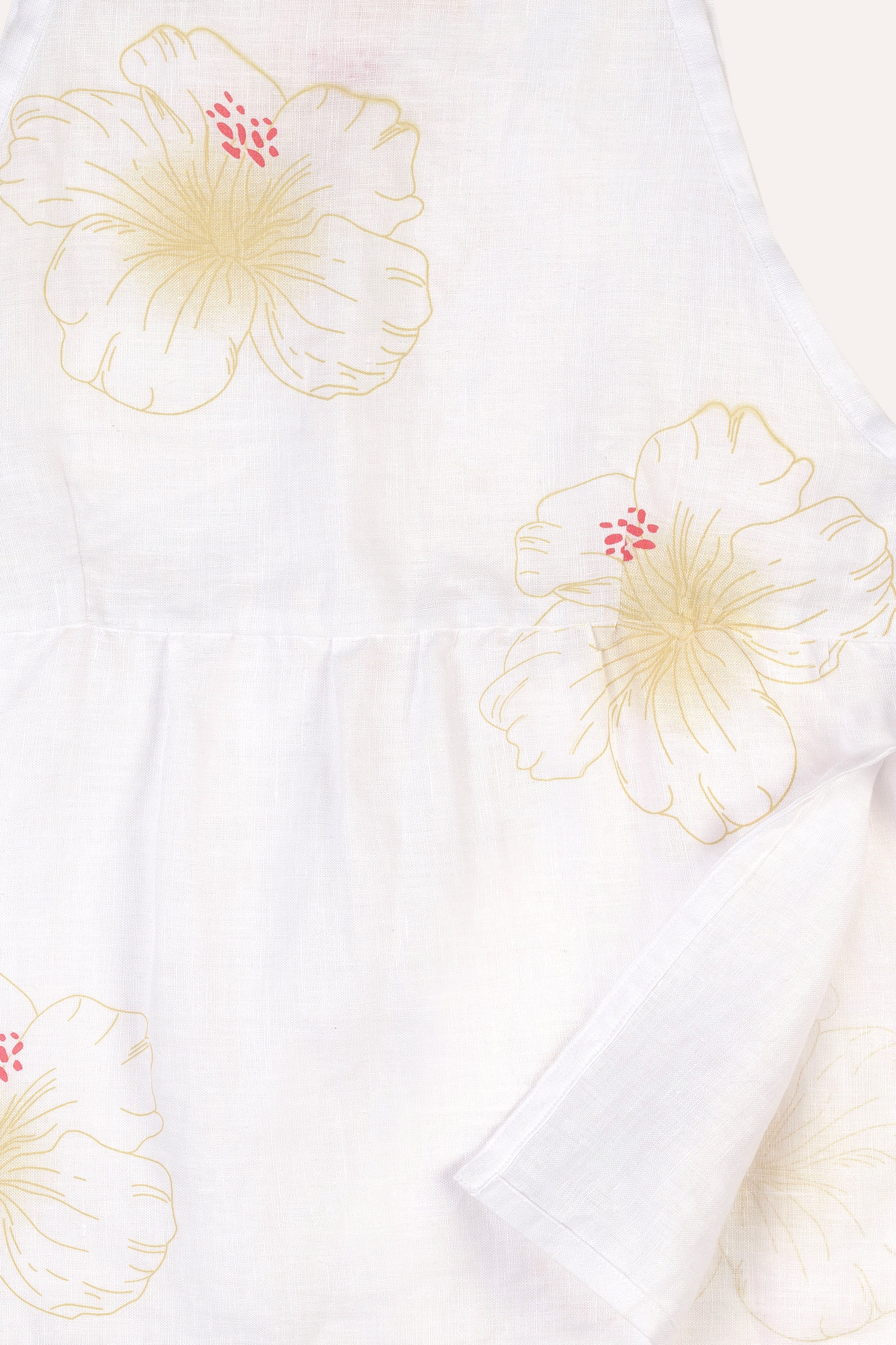 White top with floral prints on a white background