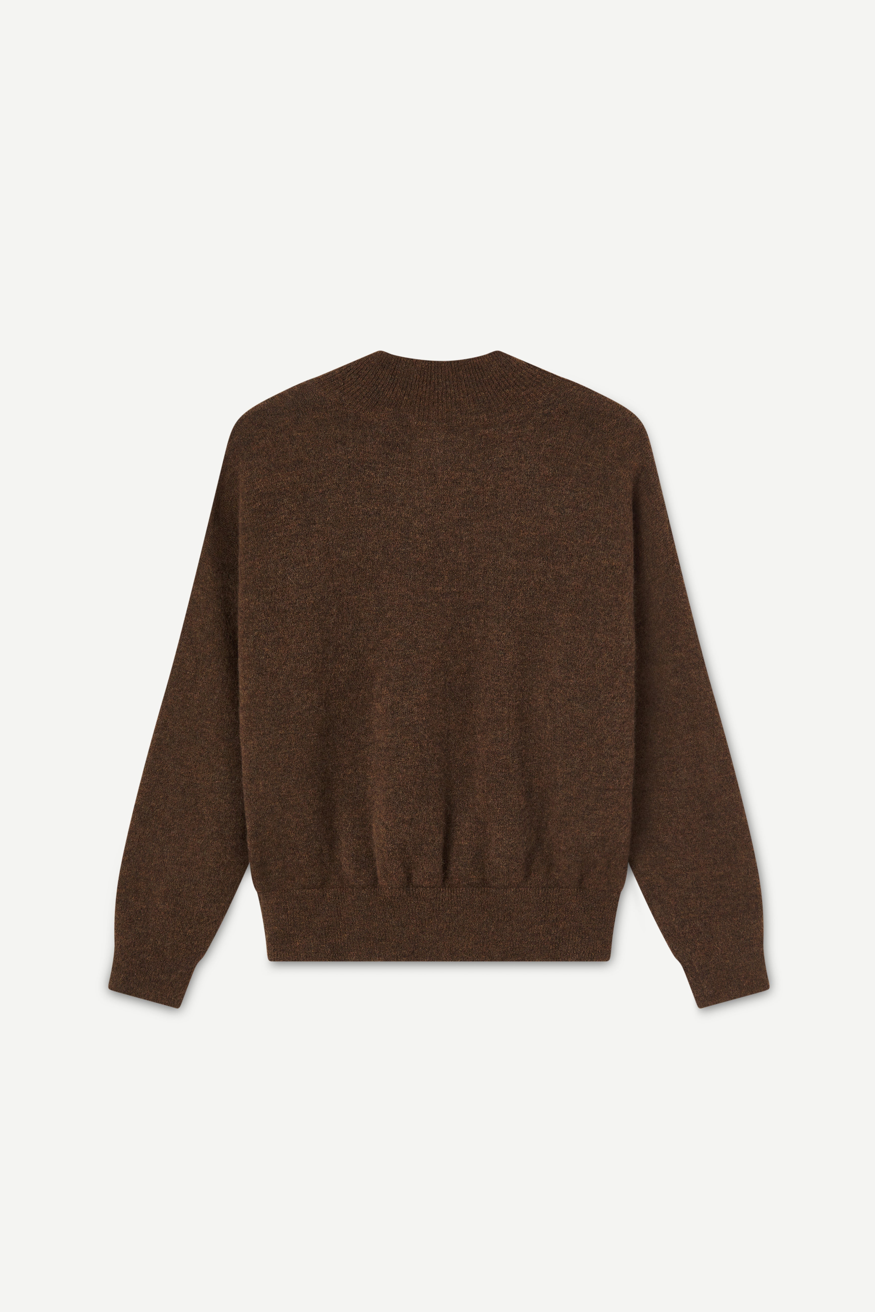 Back view of a brown sweater on a white background