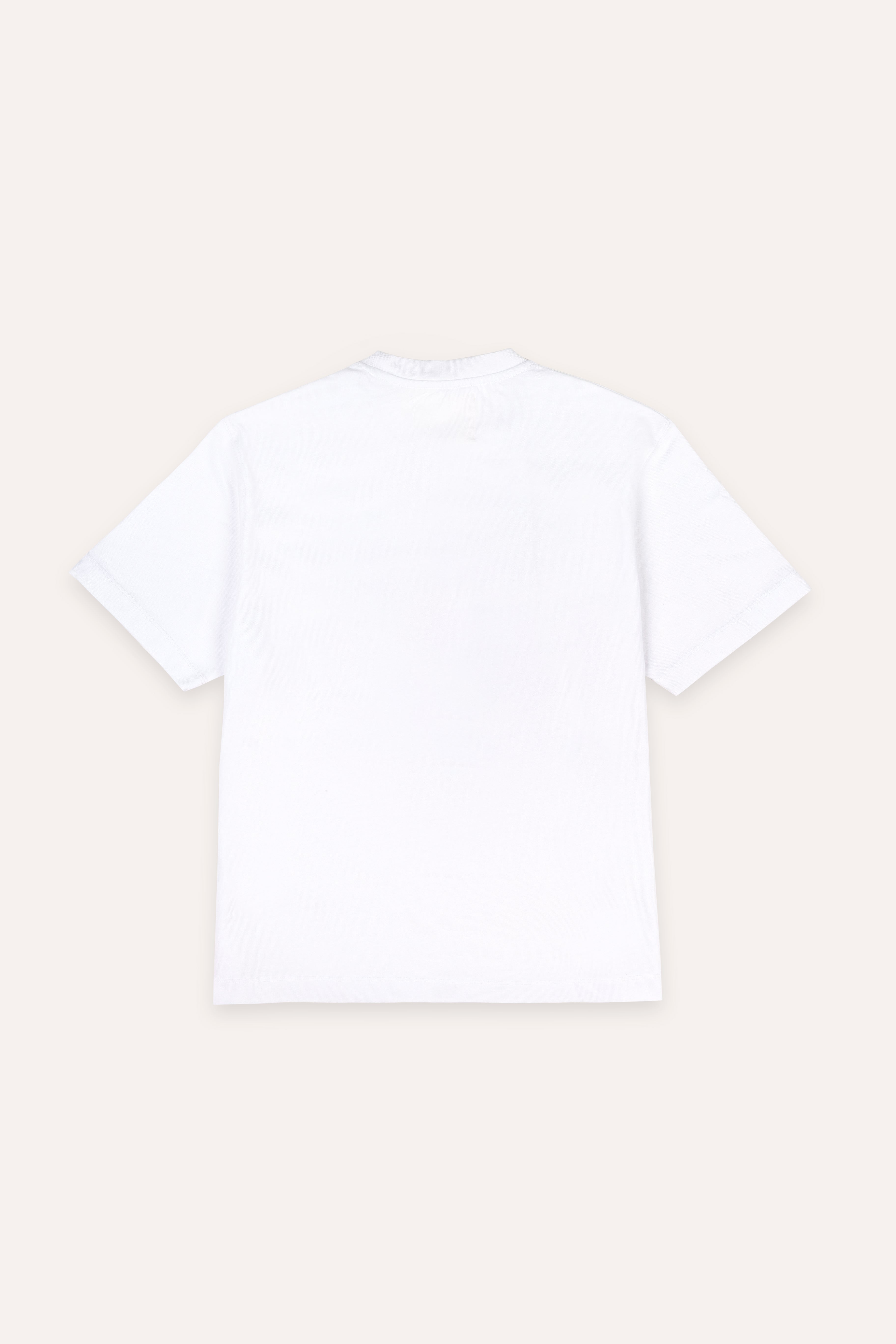 Plain white t-shirt on a beige background