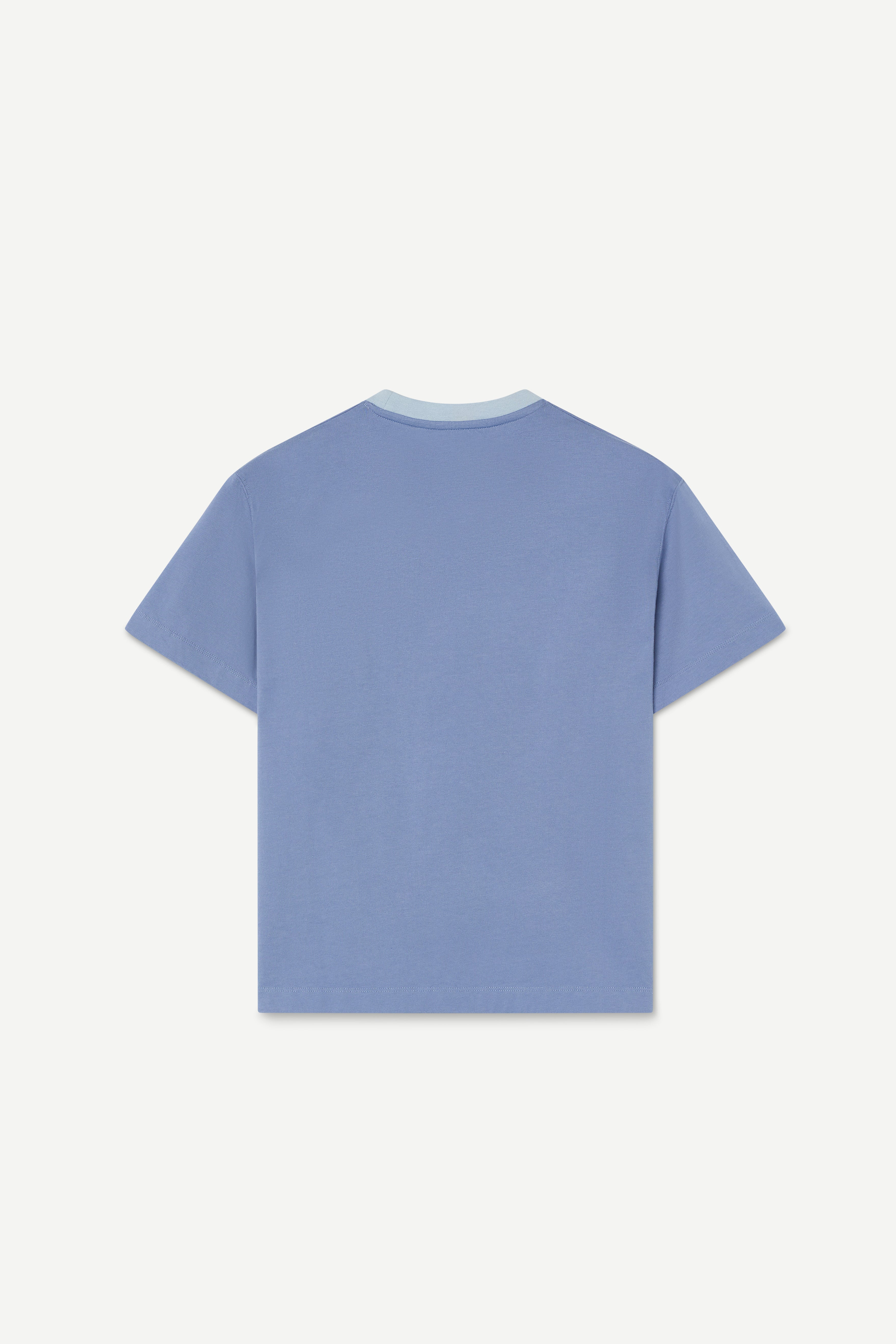 Blue t-shirt on a light gray background