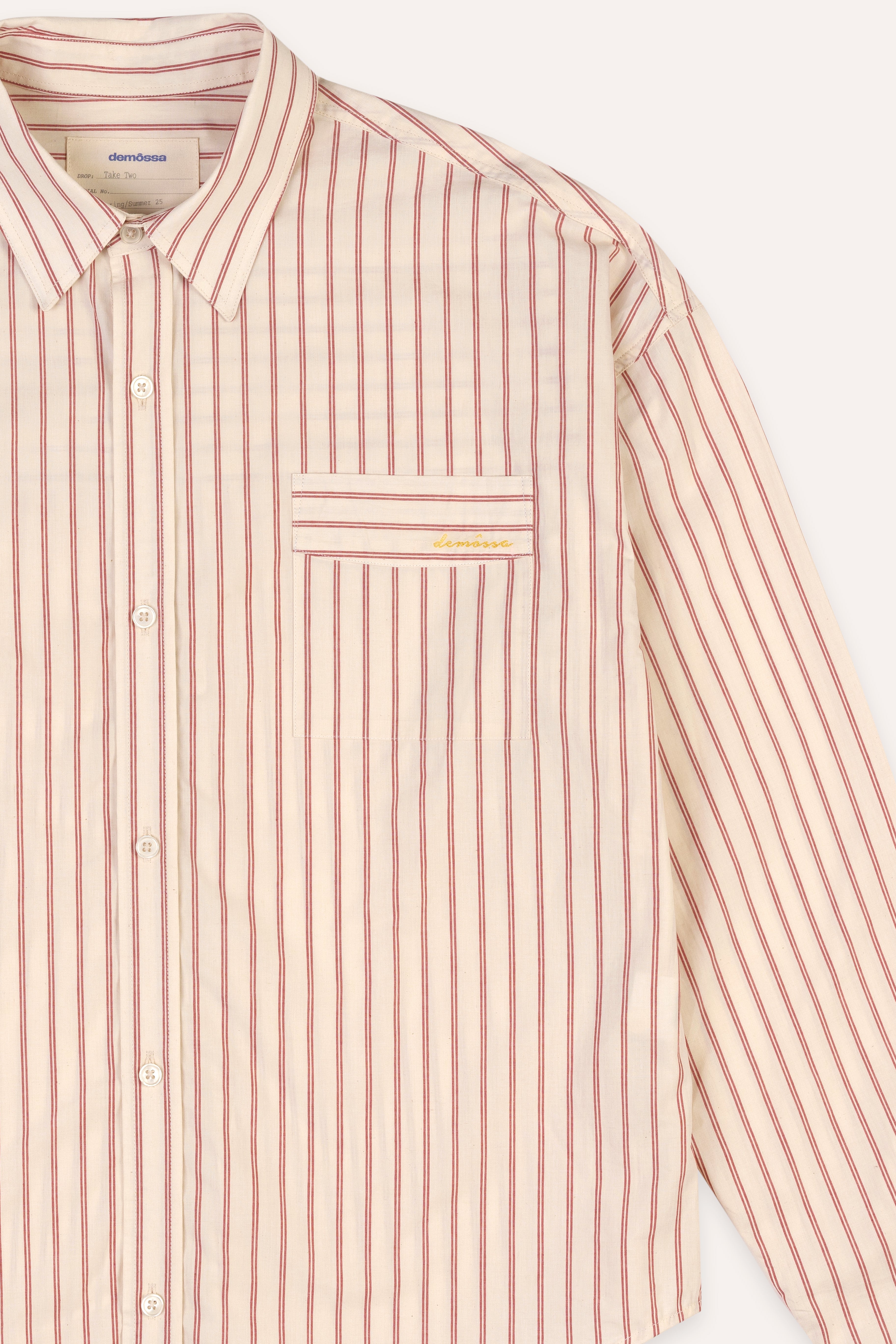 Striped shirt with a brand logo on a white background