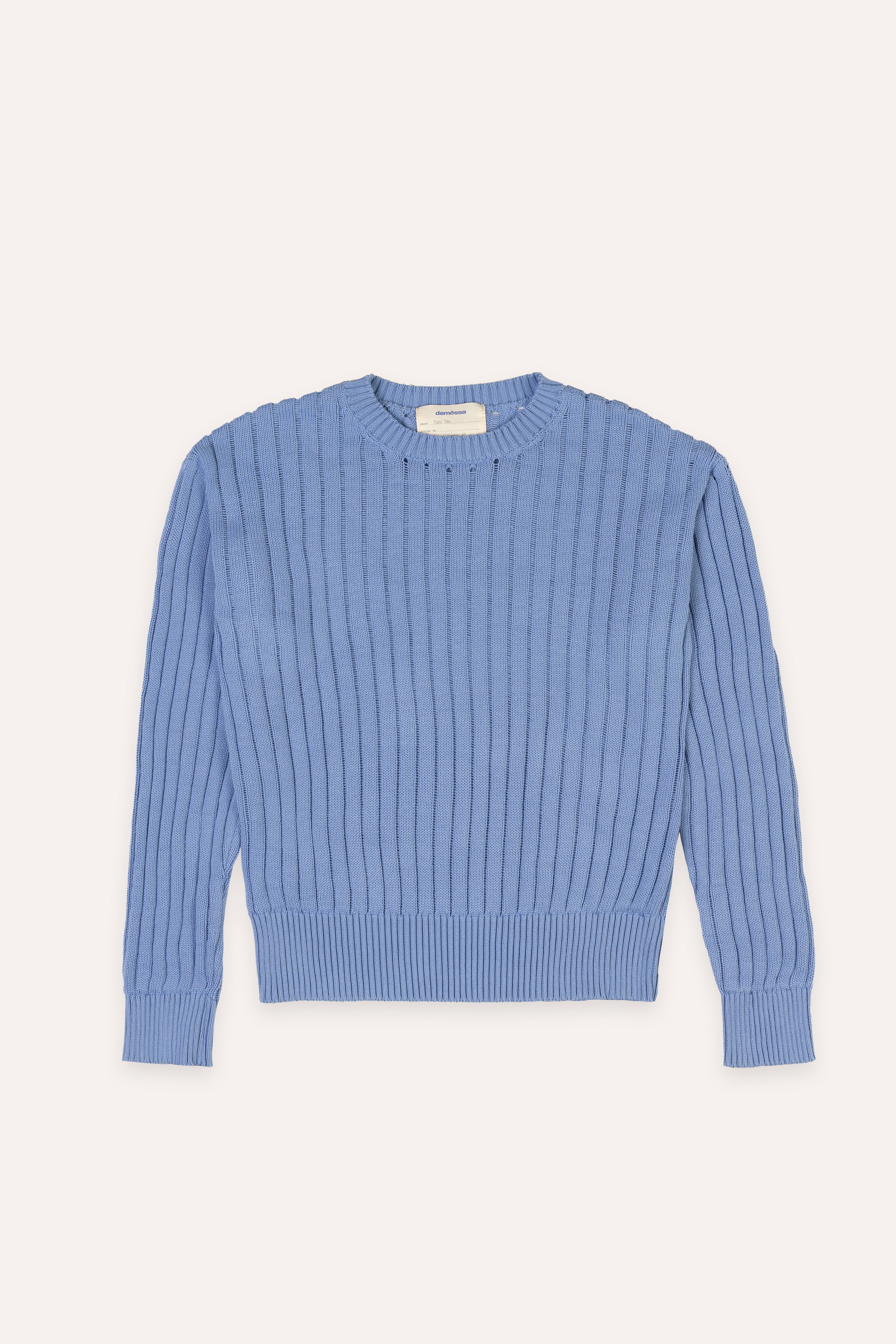 Blue ribbed sweater on a white background