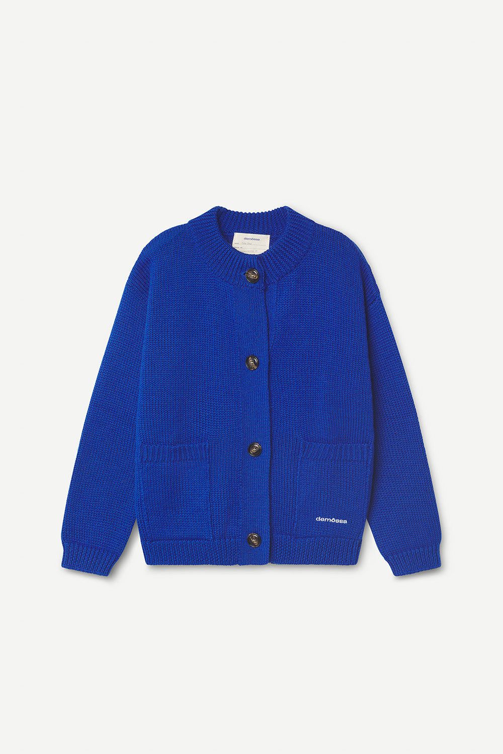 Blue cardigan with black buttons and front pockets on a white background