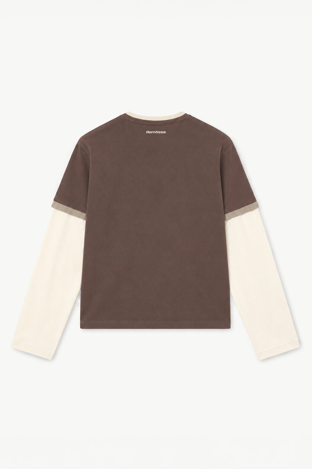 A long-sleeve crewneck shirt shown from the back, featuring a dark brown upper body and sleeves, with contrasting cream-colored sleeves and a thin beige stripe at the cuffs.