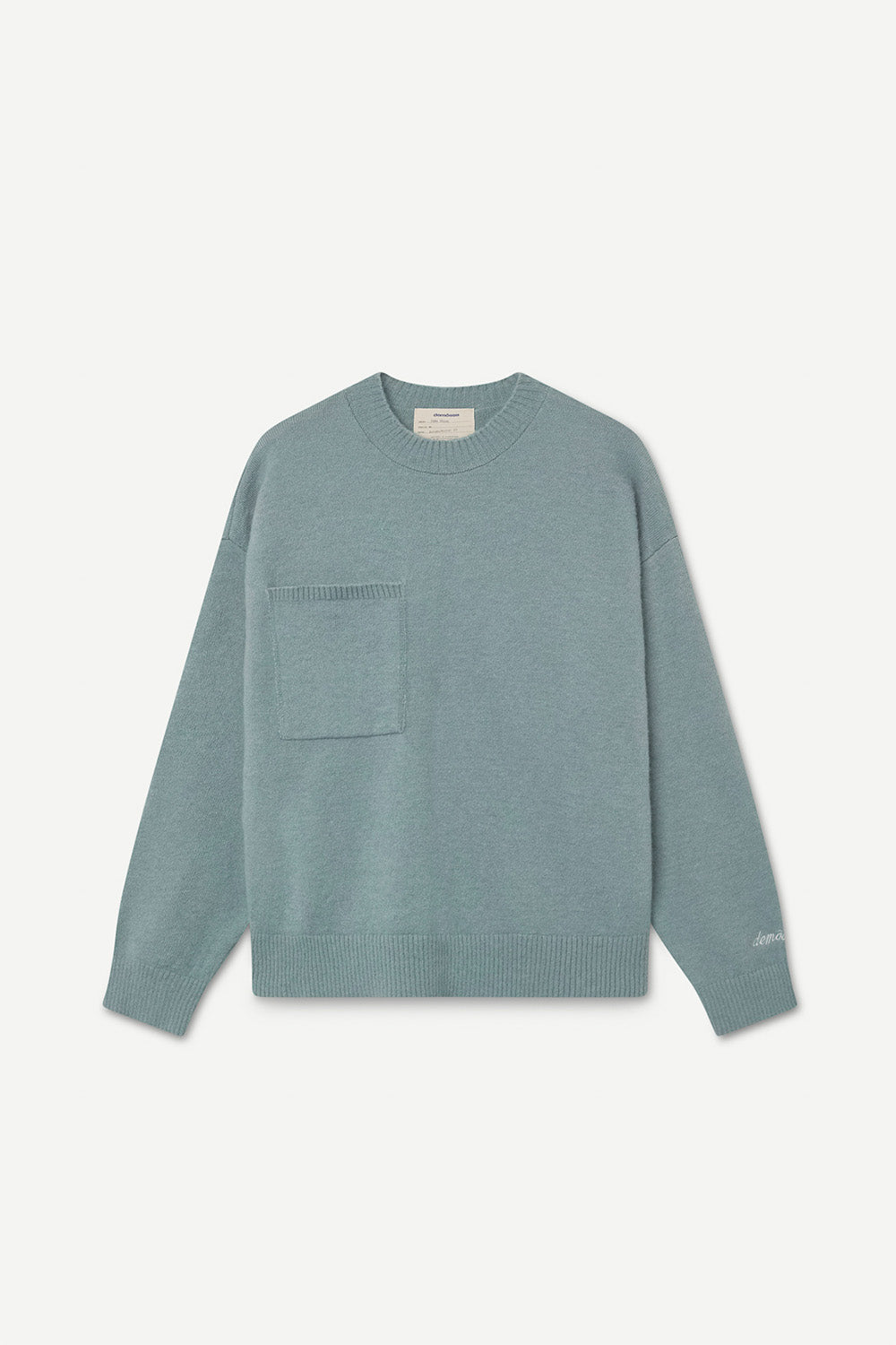 Turquoise sweater with front chest pocket on a white background