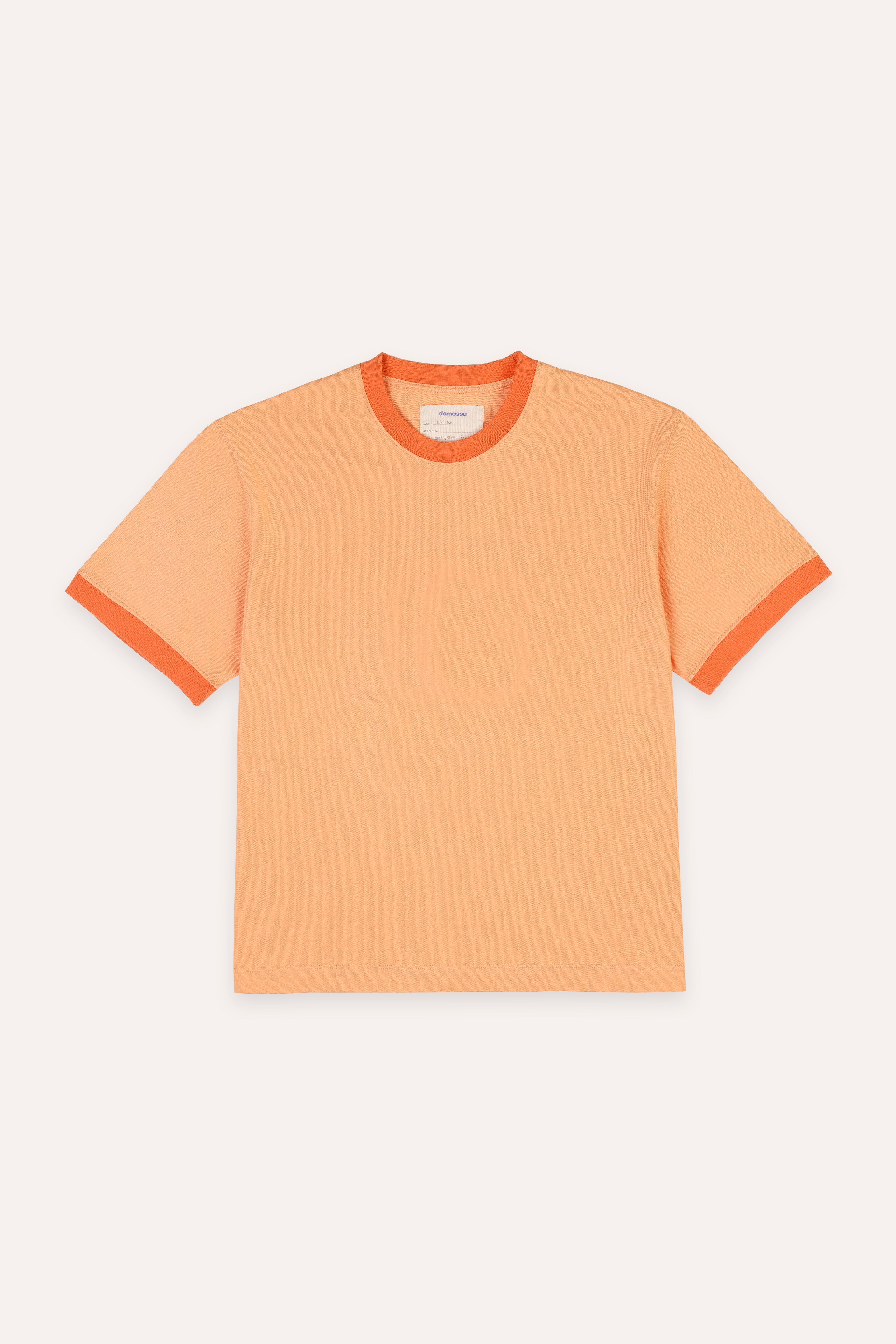 Orange t-shirt with contrast ribs on a white background