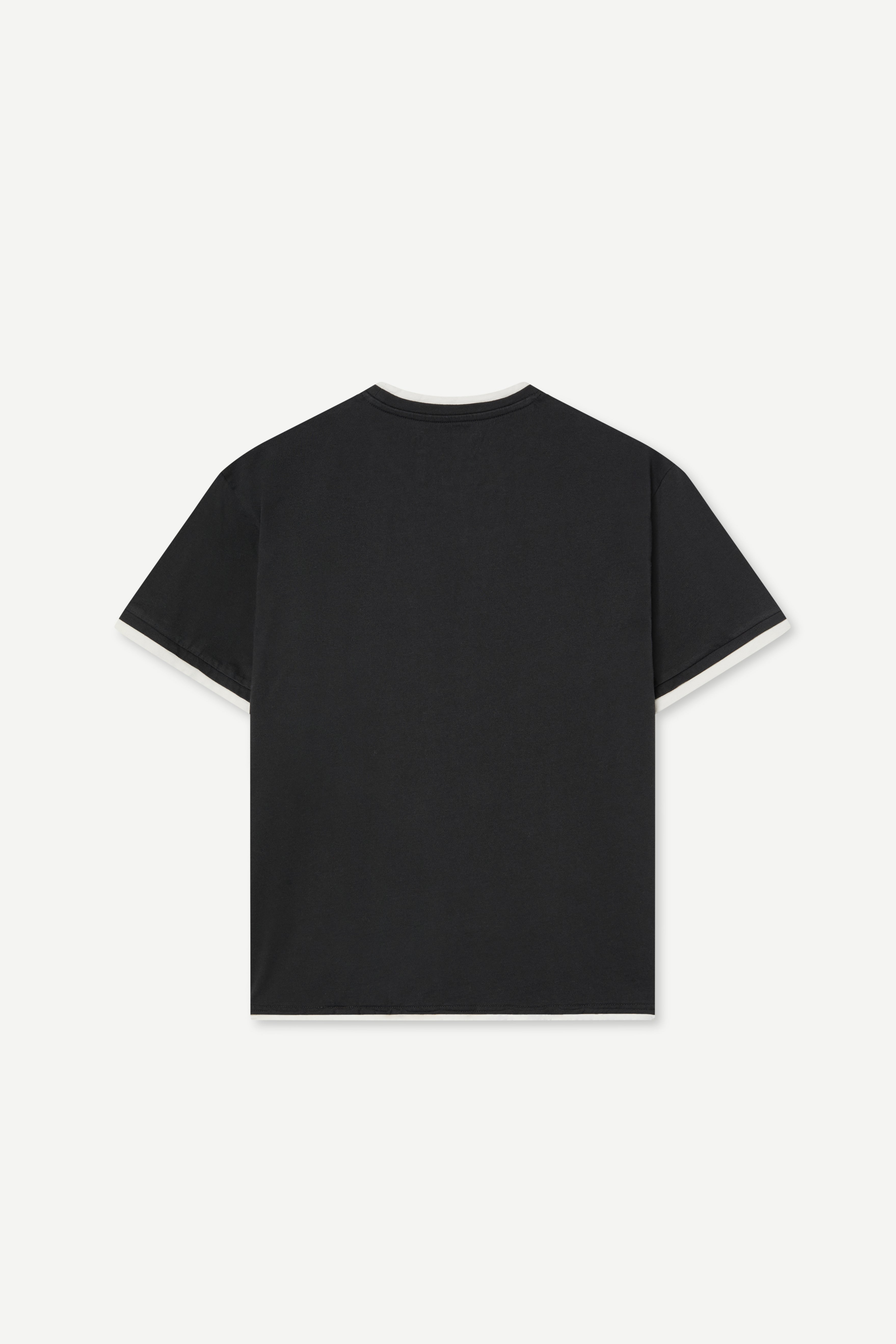 Black t-shirt on a light gray background